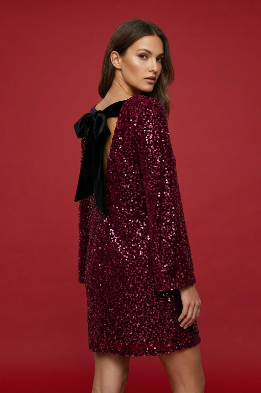 ABITO CON PAILLETTES CON FIOCCO