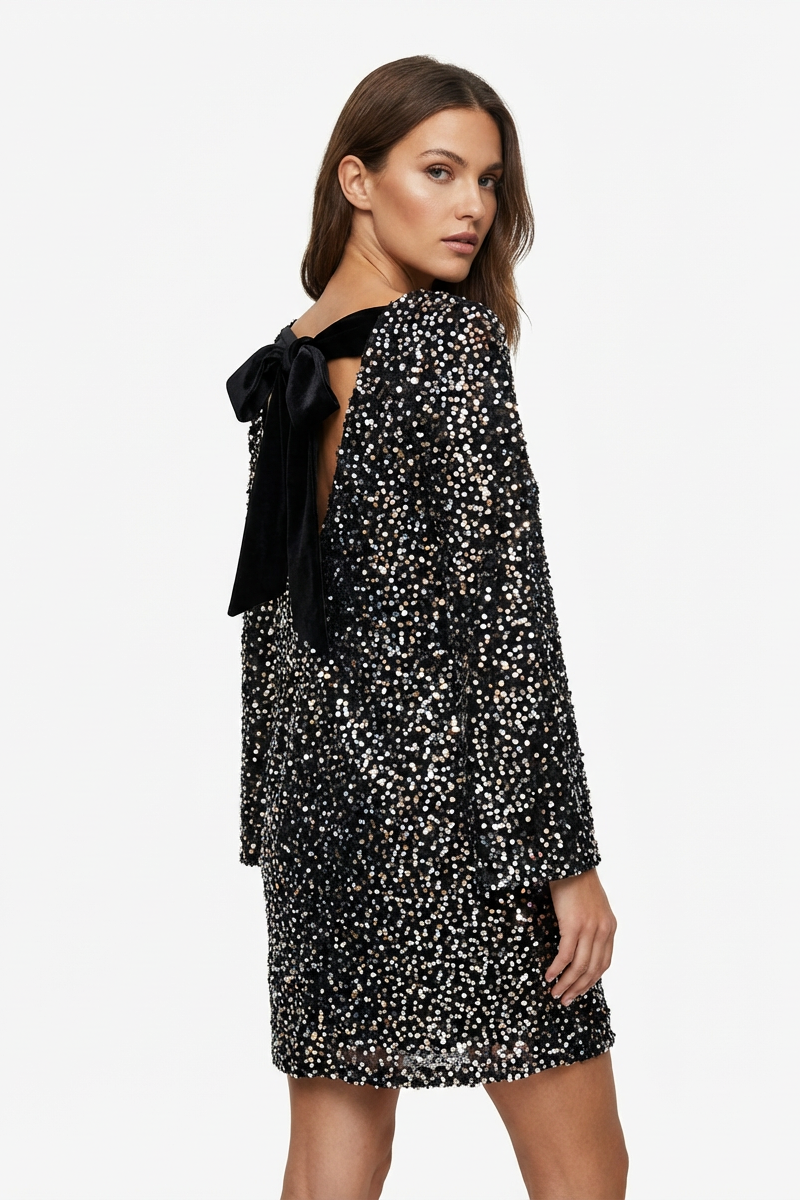 ABITO CON PAILLETTES CON FIOCCO