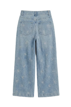 Jeans con fiocchi ricamati