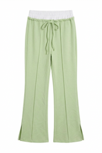 Pantalone con dettaglio in vita a contrasto